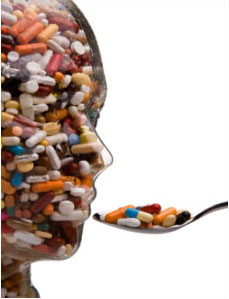 Kunststoff-Kopf gefüllt mit Tabletten